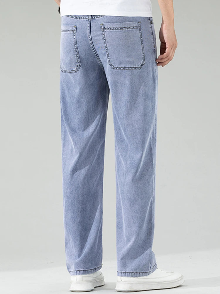 Lyocell Men's Black Jeans Summer Thin Loose Straight Soft Ice Silk Casual business Denim Pants male Elastic Wide Trousers