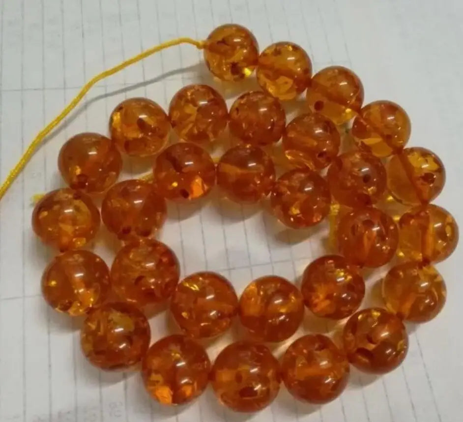 One strand 16inches long Amber Loose beads in 8mm/16MM yellow-orange/Light orange  color ef5087